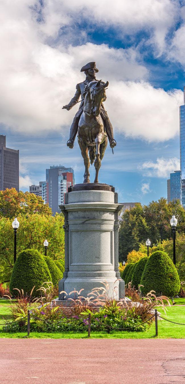 Statue of man riding horse
