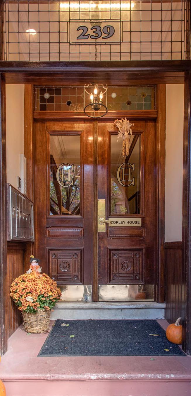 Brown door at our short term rentals in Boston, MA